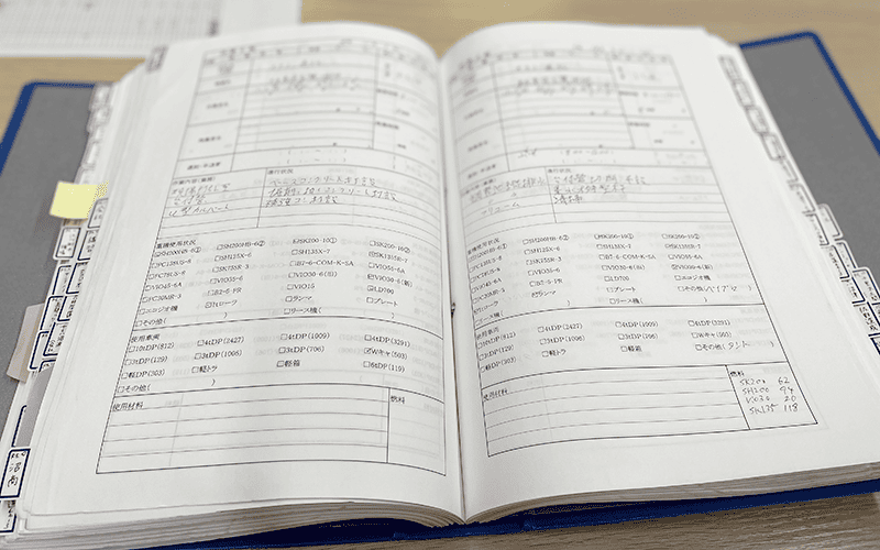 日報が書かれたノートの写真